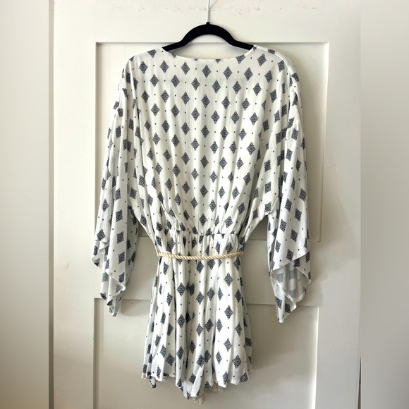 Never worn with tags shorts romper. - Picture 4 of 4